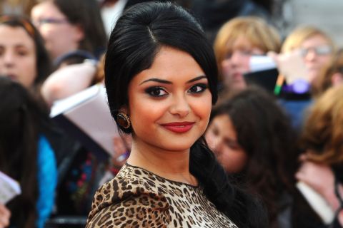 Afshan Azad poses for a picture in an event.